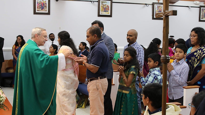 Bishop Zarama celebrates Mass with Triangle Tamil Community