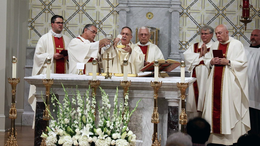 New altar is blessed to celebrate 25th anniversary of church building at St. Michael.