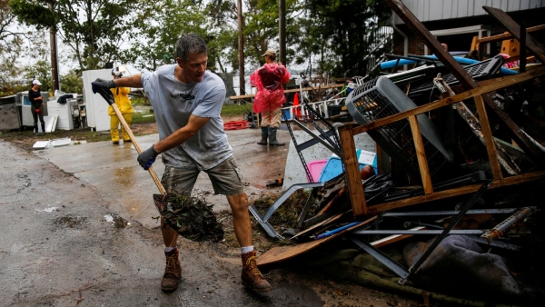 Volunteer help with cleanup after Florence called an act of 'faith, love'