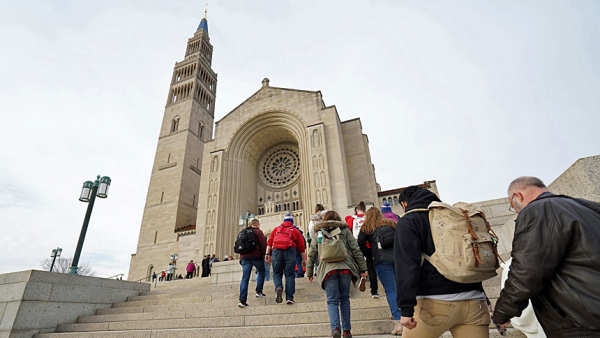 People arrive for the National Prayer Vigil for Life Jan. 23, 2020, at the Basilica of the National Shrine of the Immaculate Conception in Washington. Because of the coronavirus pandemic, the 2021 vigil will only be broadcast Jan. 28 at 8 P.M. ET, and then bishops from across the country will take turns leading livestreamed Holy Hours throughout the all-night vigil. (CNS photo/Gregory A. Shemitz)