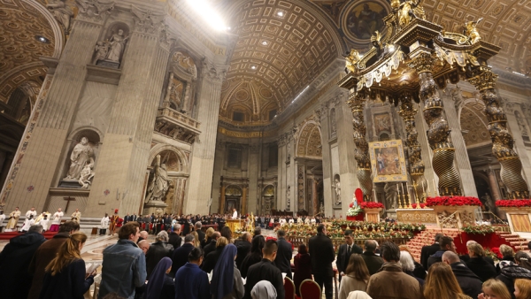 Attendees participate in an evening prayer service with Pope Francis in St. Peter's Basilica for New Year's Eve at the Vatican Dec. 31, 2024. (CNS photo/Lola Gomez)